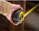 Рулетка измерительная CONTROL-LOCK длиной 8 м, шириной 25 мм, в прорезиненном корпусес, двухсторонней шкалой STANLEY STHT37232-0